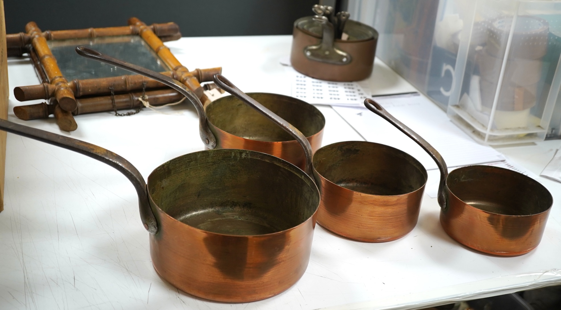 A graduated set of seven French copper pans